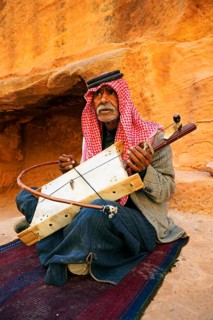 Old bedouin playing the one-string Lyra