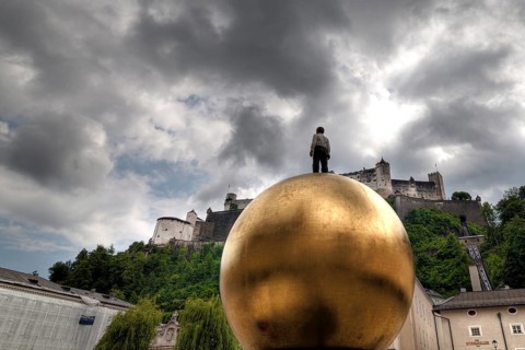 Man on a golden ball