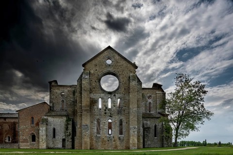 Dark clouds over the ruins of the former Cistercian Abbey of San Galgano