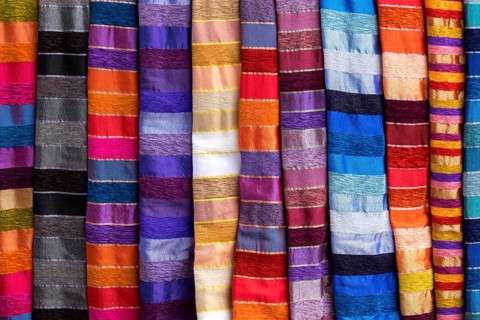 Colorful striped cloths for sale at the street stall