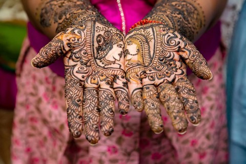 Close up of mehendi on bride's hand