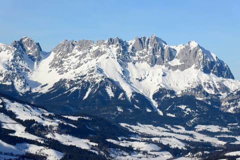 Snow-covered mountain massif Wilder Kaiser in winter with Ellmauer Tor