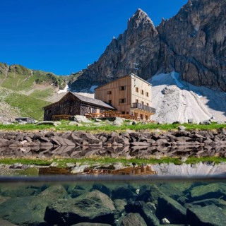 South Tyrolean Tribulaunhutte at lake