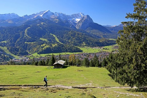 Eckenhutte am Wank with view on the village and the Wetterstein range with Alpspitze 2628m and Zugspitze 2962m