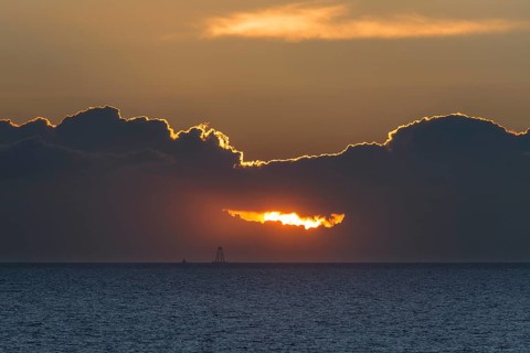 Sunset with dark clouds over the Baltic Sea