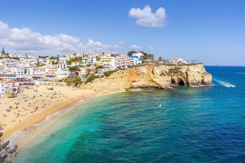 Sandy beach and white houses