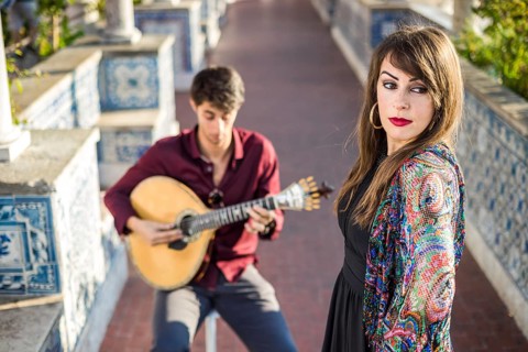 Band performing traditional music fado under pergola with portuguese tiles called azulejos in Lisbon