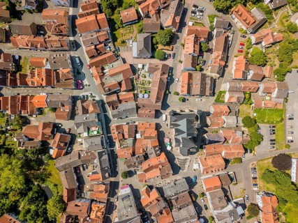 Drone image of charming little town creating architectural pattern