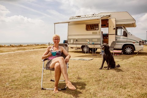 Woman sitting with a dog