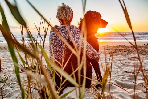 Woman sitting with her dog