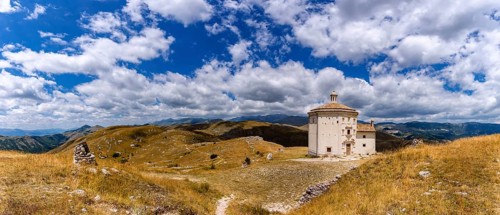 Church Santa Maria della Pieta with mountain massif Gran Sasso
