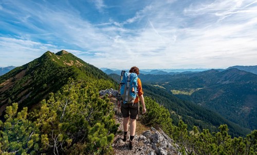 Hiker crossing the Blauberge