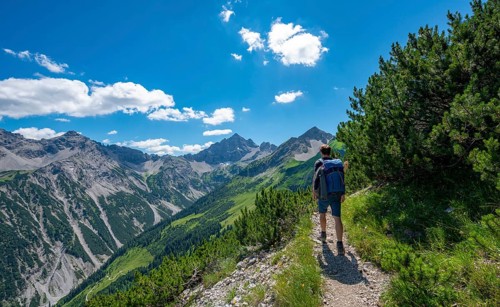 Hiker on hiking trail Jubilaumsweg