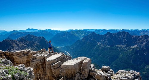 Hiker standing on rocks