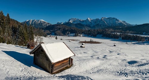 Haystack in snow-covered landscape