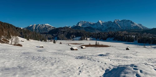 Frozen Lake Geroldsee in winter in front of Karwendel Mountains