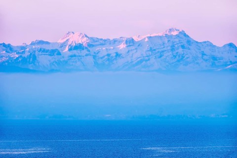 Lake with mountains Altmann and Santis in Switzerland