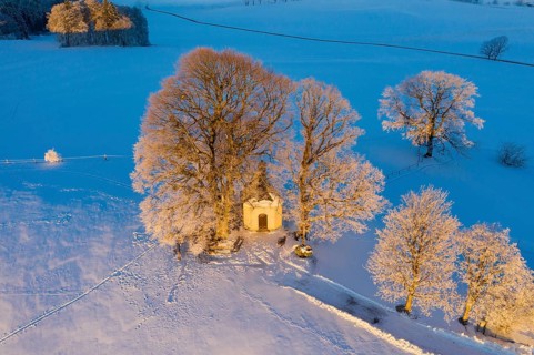 Maria-Dank-Kapelle on Furst-Tegernberg in the morning light in winter