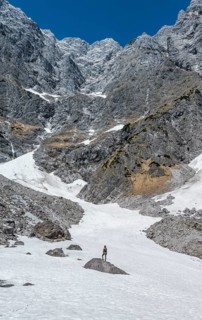 Hiker standing on rock