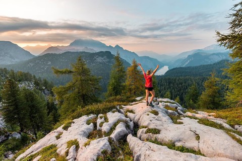 Hiker looks at mountain panorama