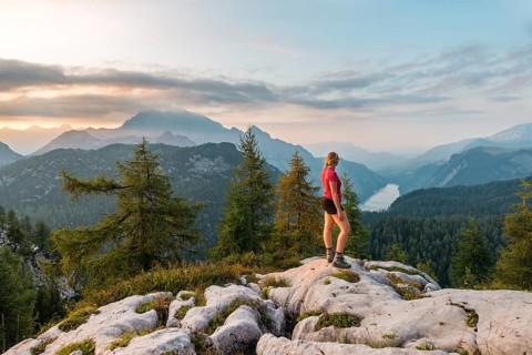 Hiker looks at mountain panorama