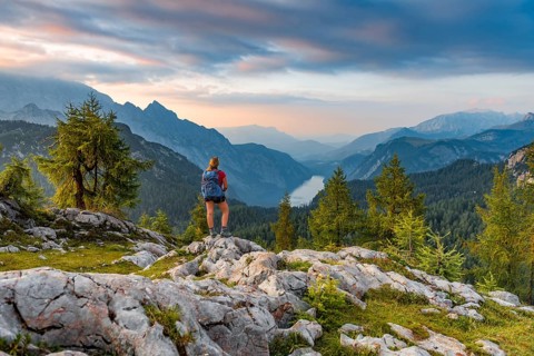 Hiker looks at mountain panorama