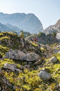 Two hikers on a rock