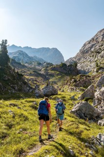Two hikers on one hiking trail