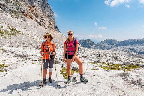 Two hikers look into the camera