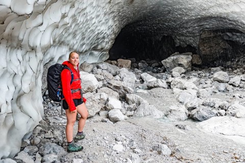 Female hiker in front of the ice chapel