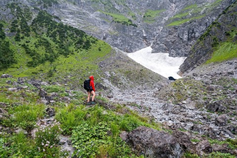 Female hiker in front of the ice chapel