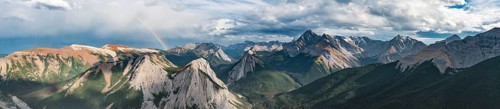 Rainbow view over mountain landscape
