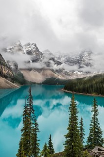 Clouds hanging between the mountain peaks