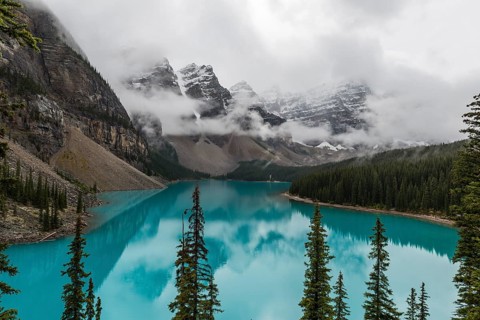 Clouds hanging between the mountain peaks