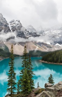 Clouds hanging between the mountain peaks