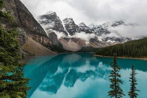 Clouds hanging between the mountain peaks