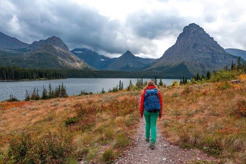 Woman walking on a hiking trail