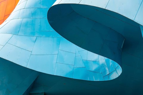 Curved colored facade of the Museum of Pop Culture