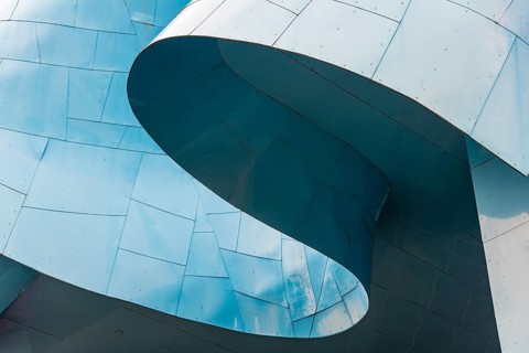 Curved colored facade of the Museum of Pop Culture