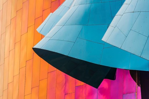 Curved colored facade of the Museum of Pop Culture
