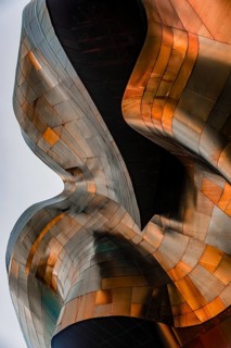 Copper coloured curved facade of the Museum of Pop Culture