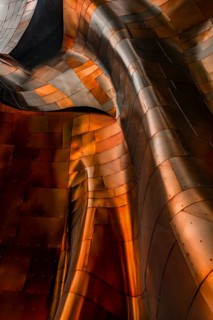 Copper coloured curved facade of the Museum of Pop Culture