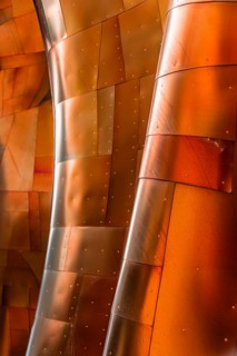 Copper coloured curved facade of the Museum of Pop Culture