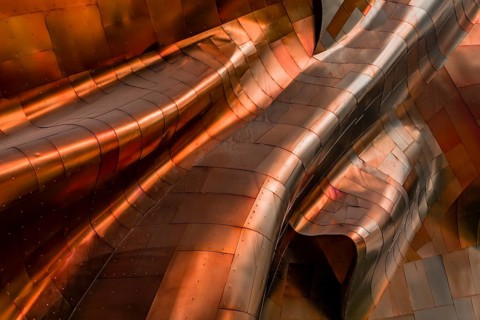 Copper coloured curved facade of the Museum of Pop Culture