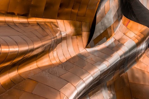 Copper coloured curved facade of the Museum of Pop Culture