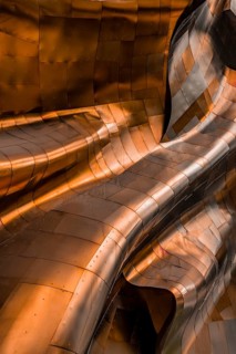 Copper coloured curved facade of the Museum of Pop Culture
