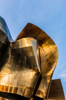 Copper coloured curved facade of the Museum of Pop Culture