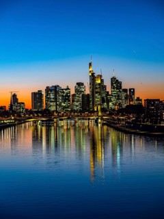 Deutschherrenbrucke with skyline at sunset