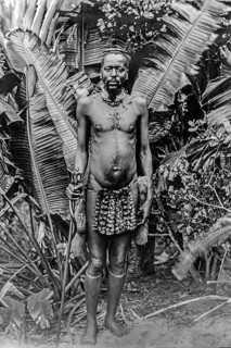 Portrait of an African man in front of banana trees