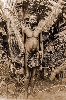 Portrait of an African man in front of banana trees
